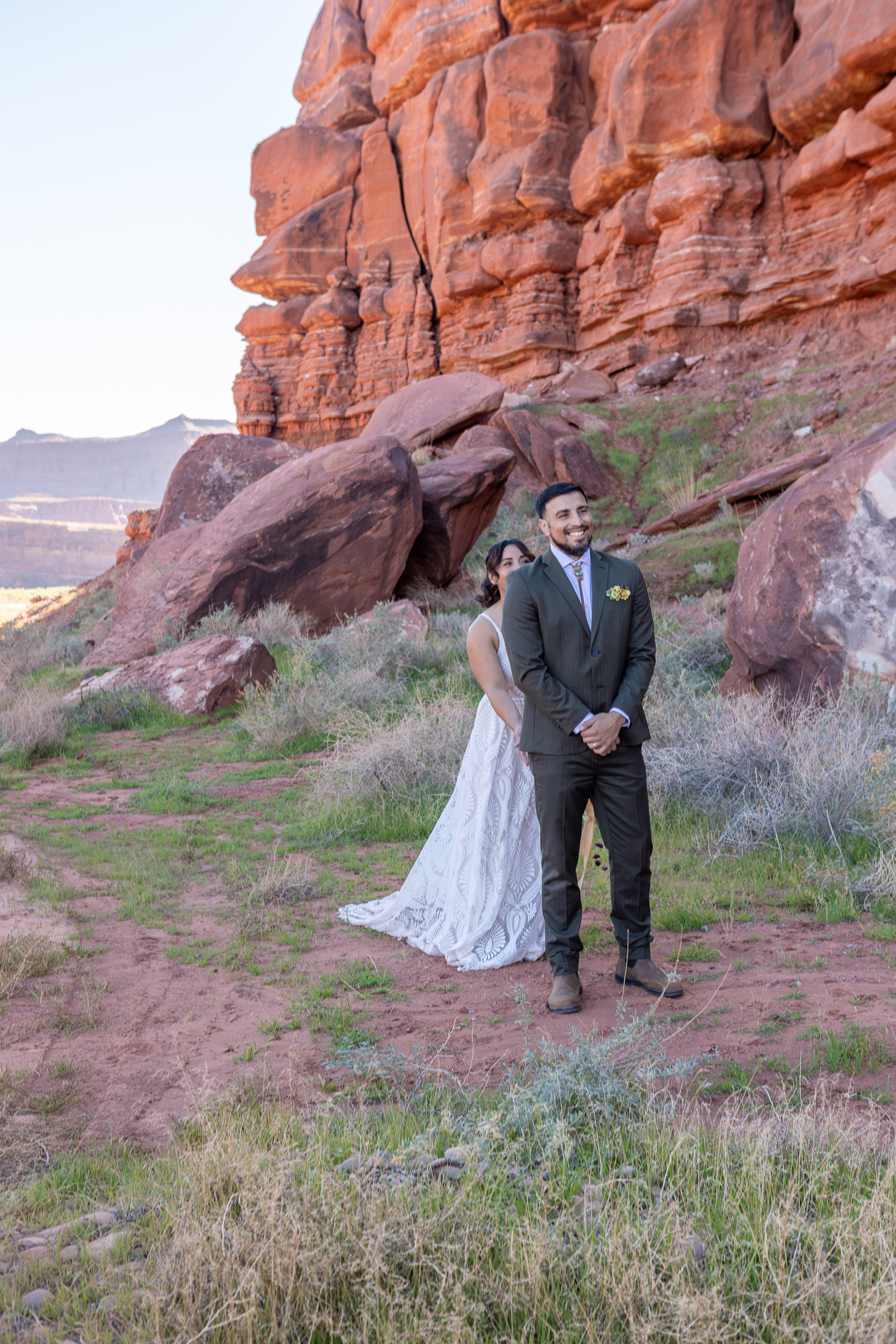 Couple sharing their first look during a Moab elopement timeline