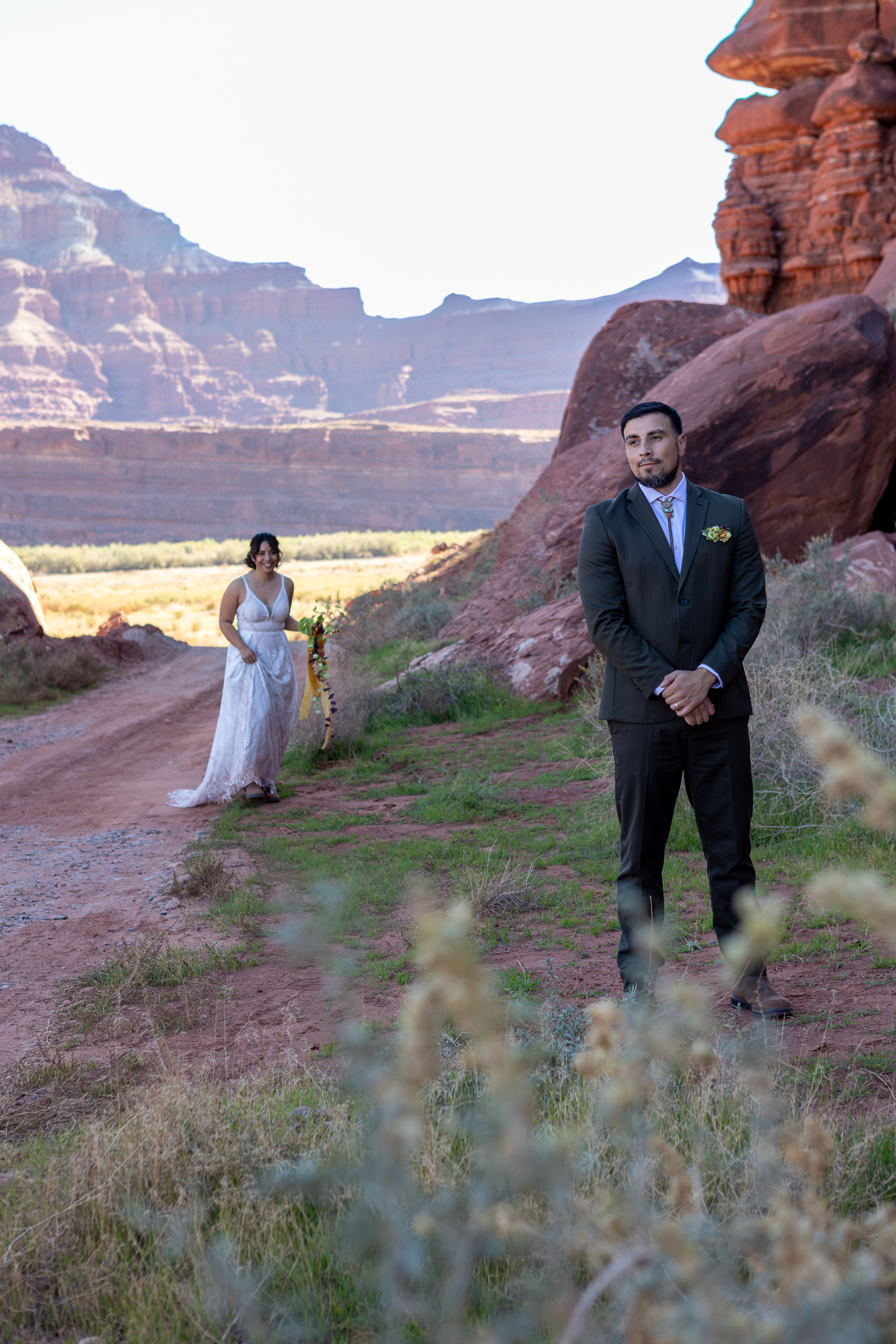 Laura is coming up from behind Hugo