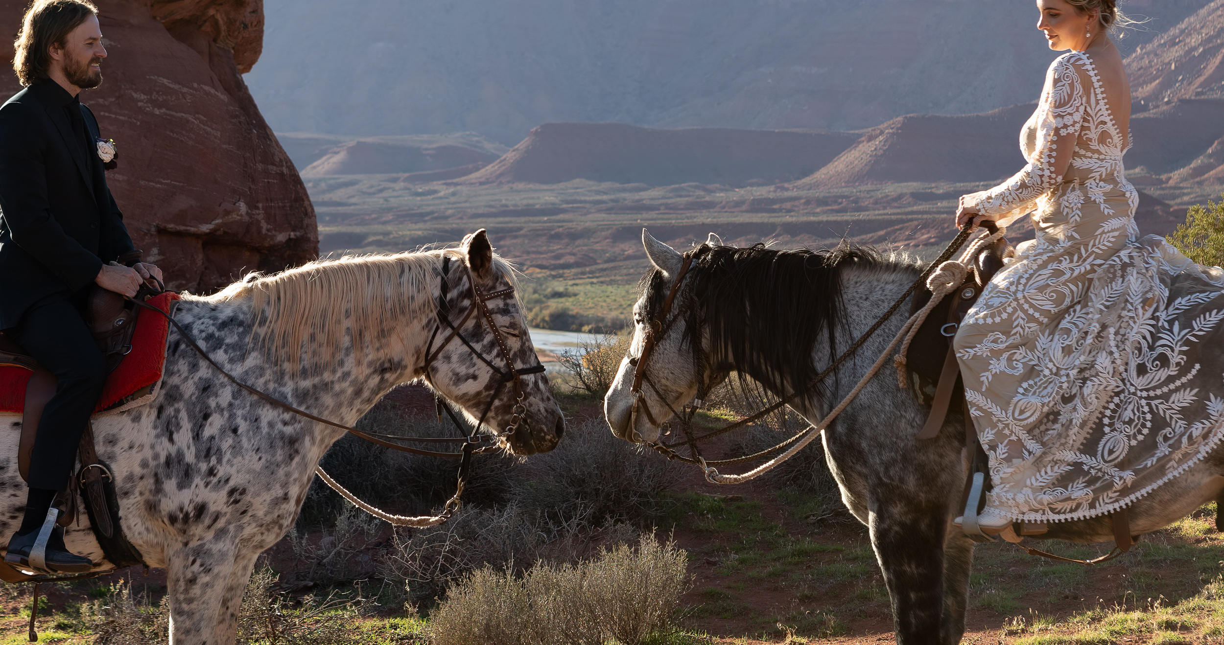 horseback riding elopement in Moab desert landscape