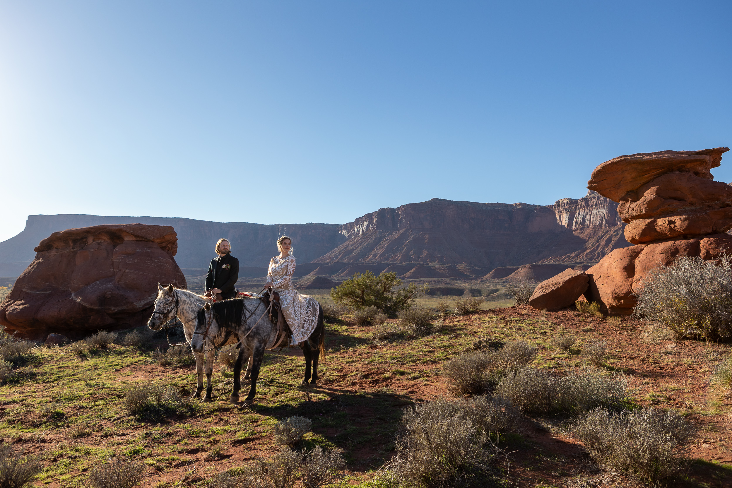 Moab elopement activity on horseback in red rock scenery