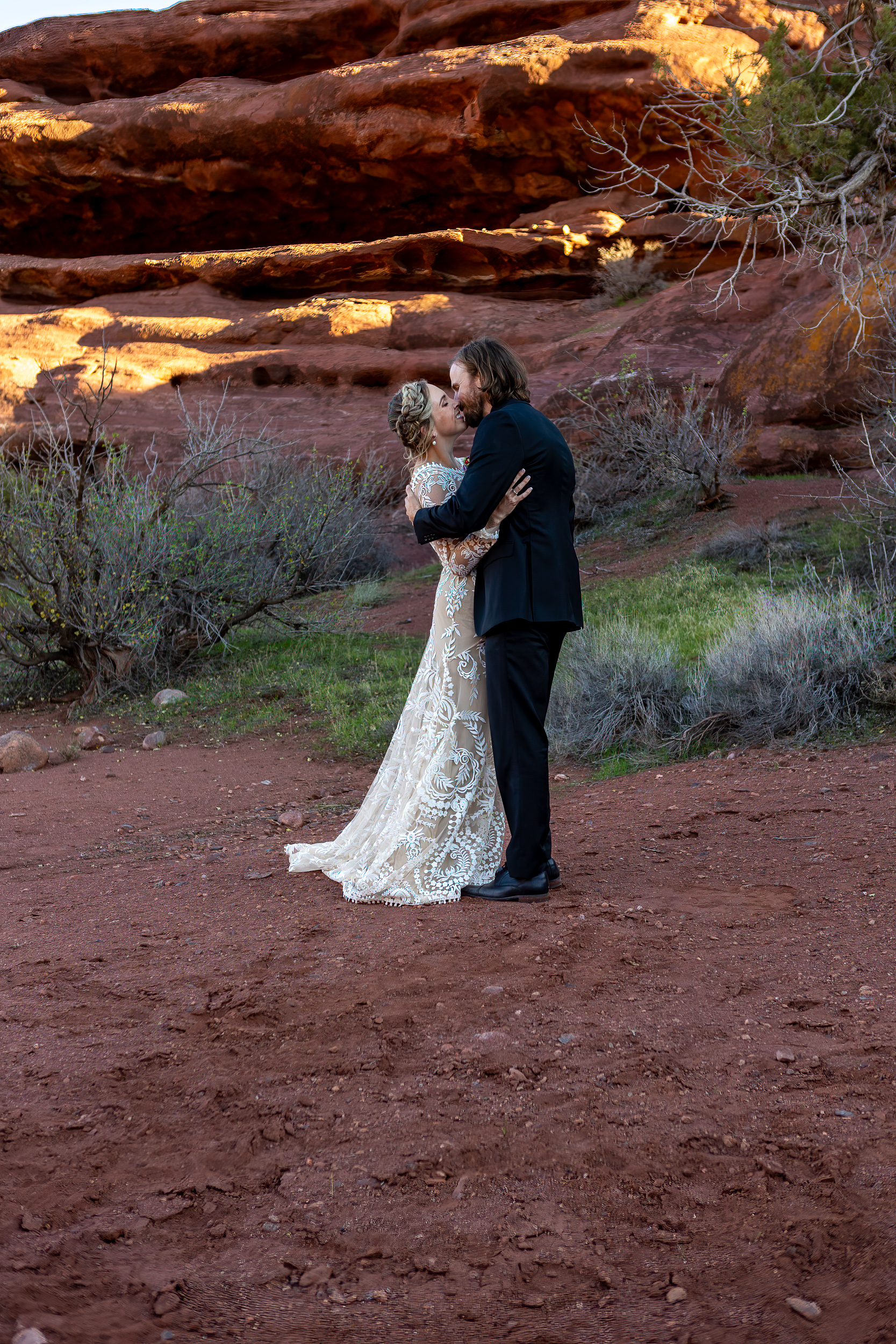 bride and grooms first kiss