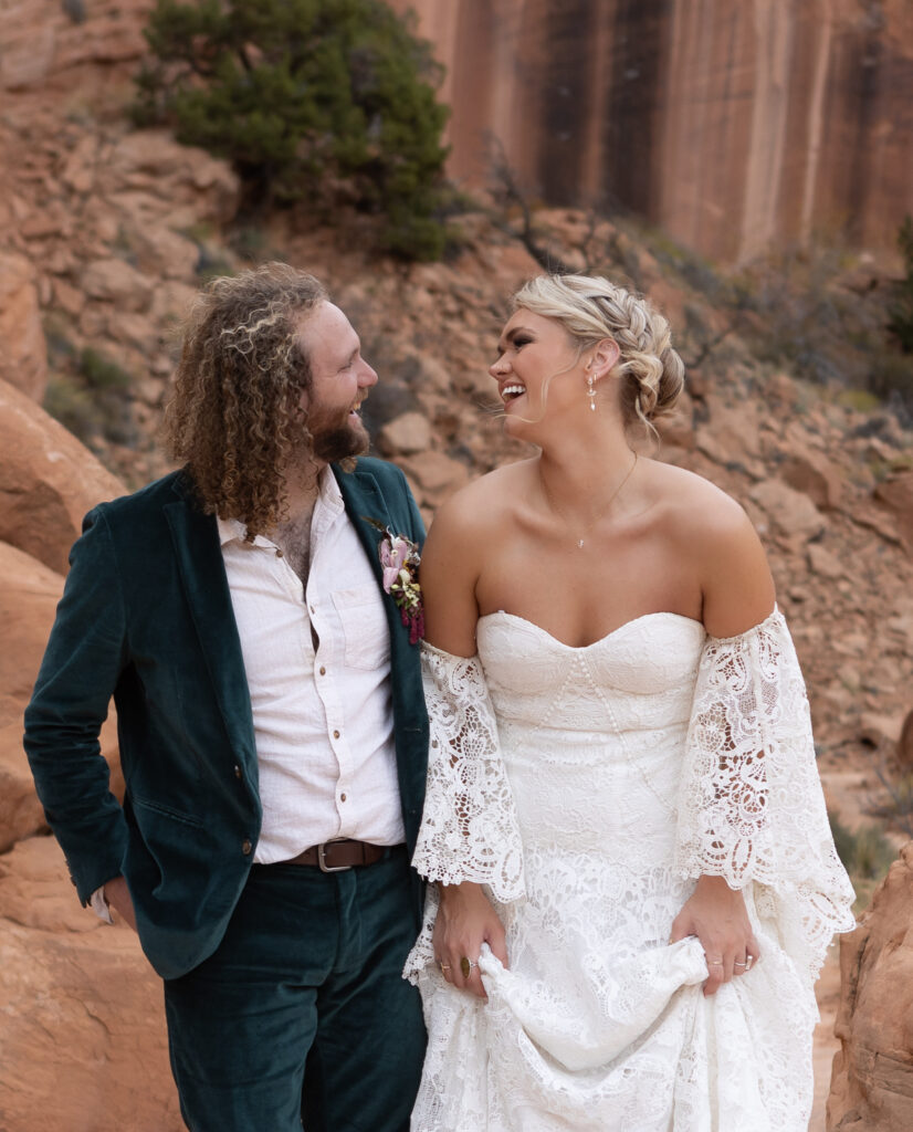 wedding couple laughing together during an outdoor elopement