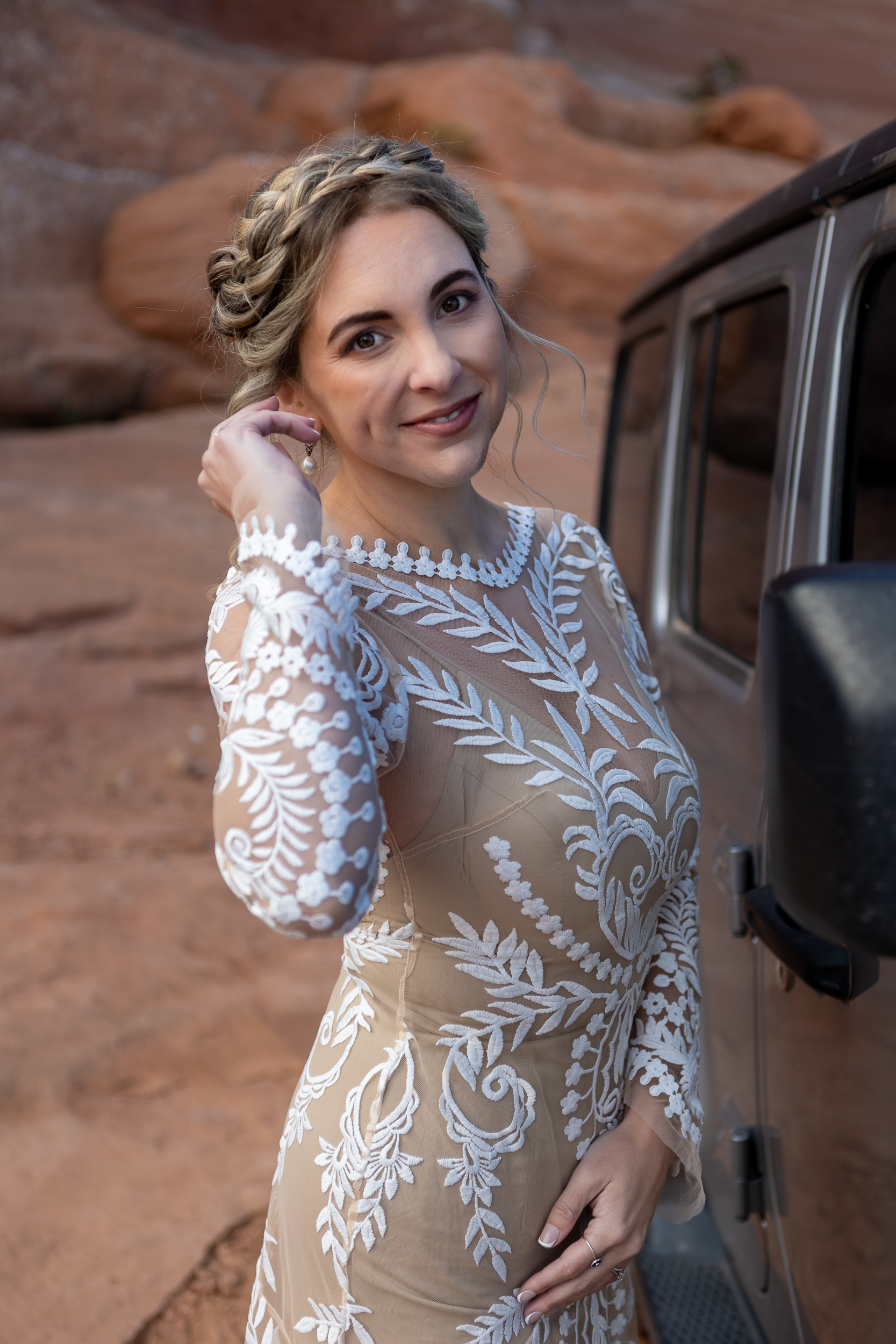 madison close up looing at camera adjusting hair