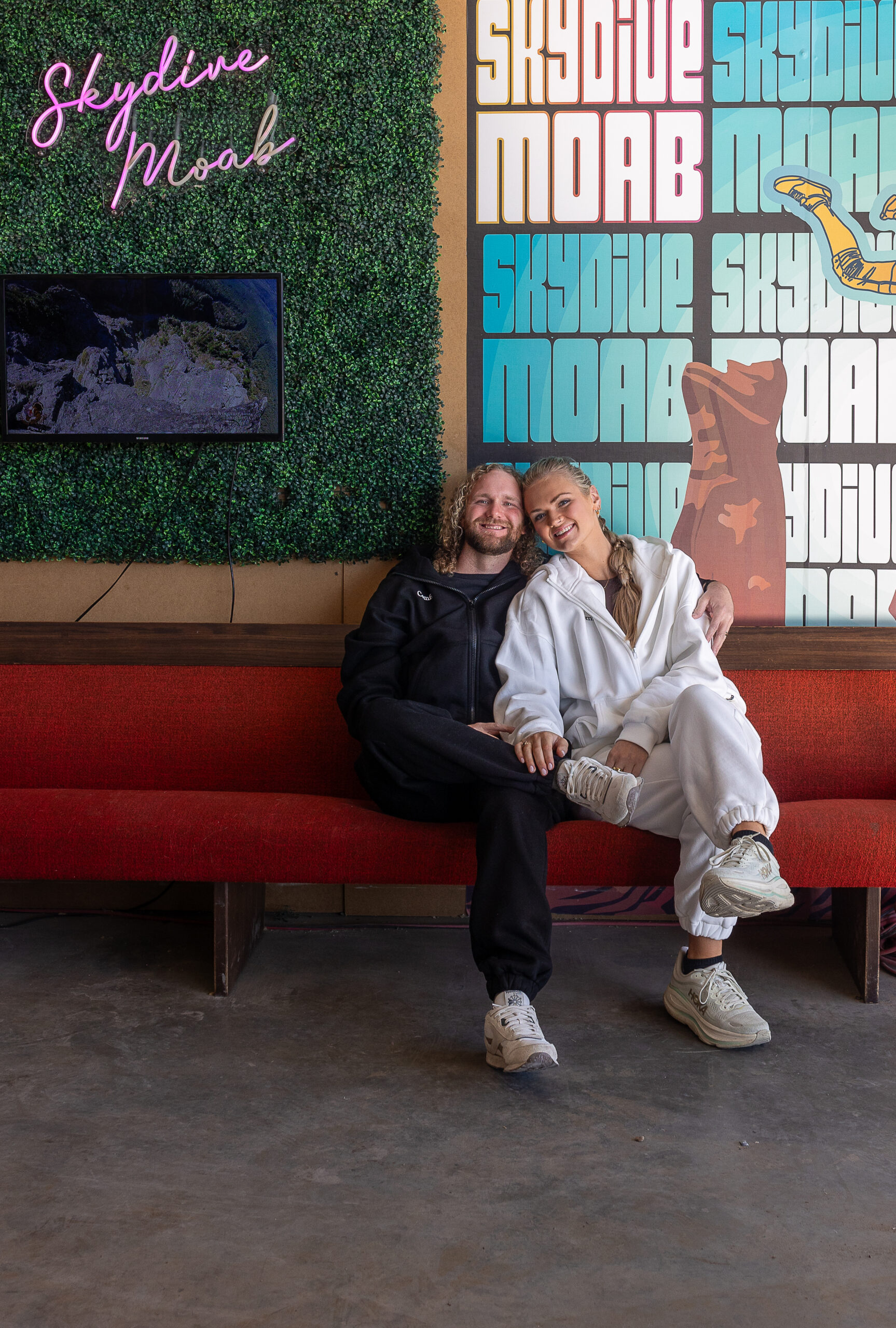 couple sharing a quiet moment before their skydiving elopement in Moab