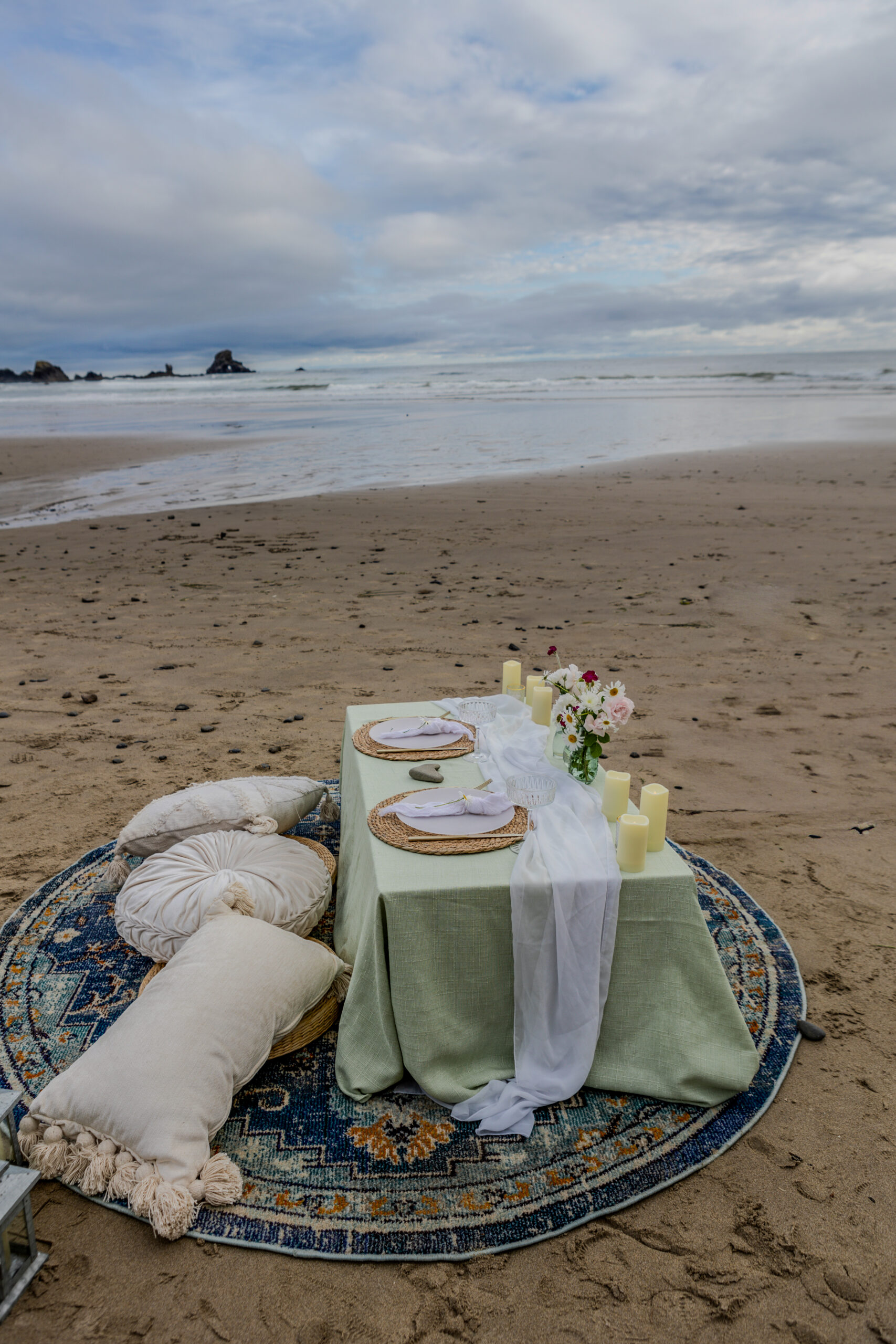 Catered picnic setup during Oregon Coast elopement at Ecola State Park