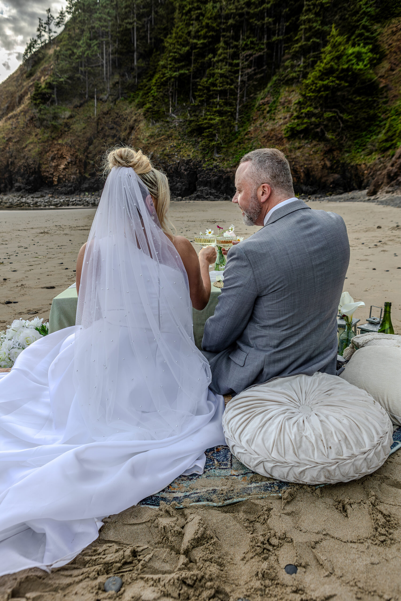 Intimate beach picnic as part of Oregon Coast elopement activities
